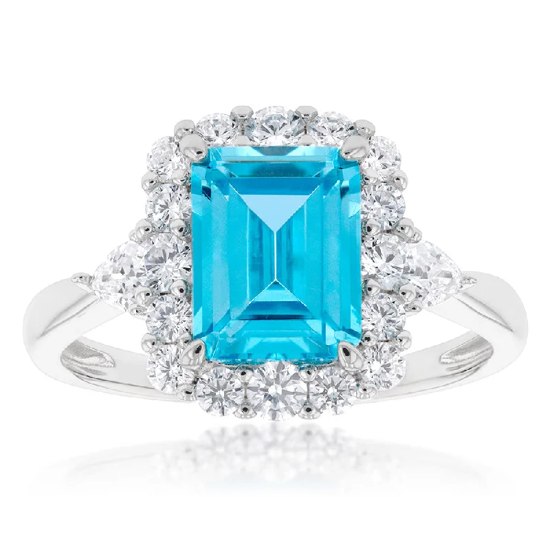 Sterling Silver Rhodium Plated White & Aquamarine Cubic Zirconia Emerald Cut Ring